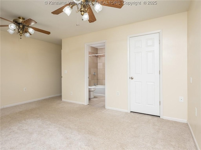 309 Kentucky Ave, Saint Albans, WV 25177 - unfurnished bedroom featuring carpet flooring, connected bathroom, and ceiling fan