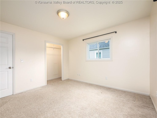 309 Kentucky Ave, Saint Albans, WV 25177 - unfurnished bedroom featuring light colored carpet and a closet
