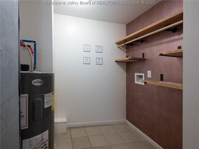 309 Kentucky Ave, Saint Albans, WV 25177 - washroom with water heater, light tile patterned floors, and washer hookup