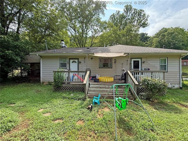 4261 Washington St W, Dunbar, WV 25313 - rear view of house with a deck and a yard