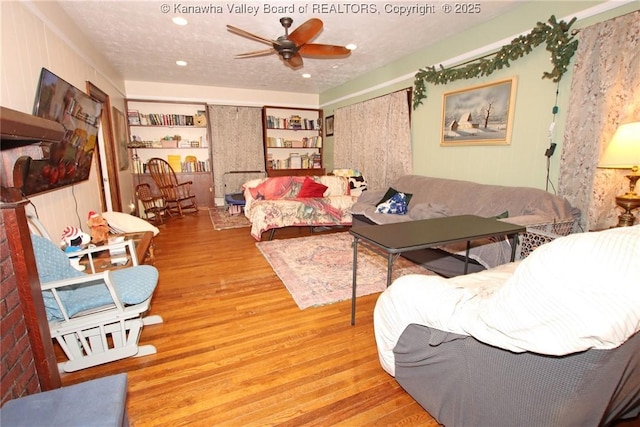 4261 Washington St W, Dunbar, WV 25313 - living area with a ceiling fan, wood finished floors, and recessed lighting