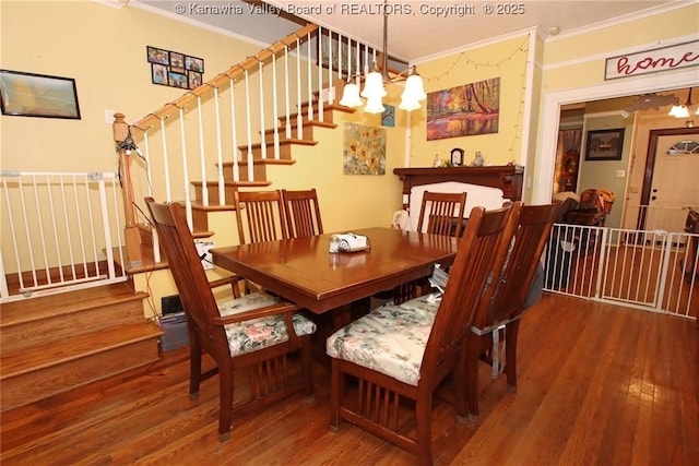 4261 Washington St W, Dunbar, WV 25313 - dining area with crown molding, hardwood / wood-style flooring, and stairway