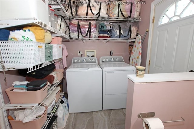 4261 Washington St W, Dunbar, WV 25313 - washroom with washer and clothes dryer and light marble finish floors