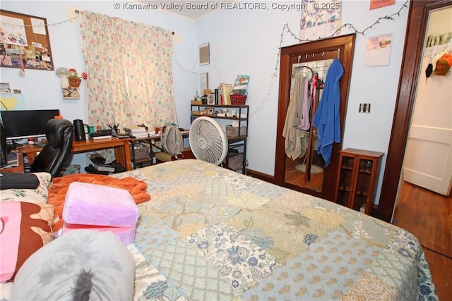 4261 Washington St W, Dunbar, WV 25313 - bedroom featuring wood finished floors, a desk, and a closet