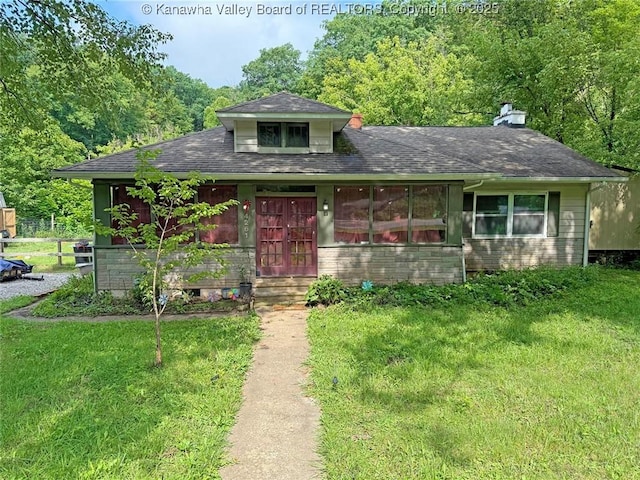 4261 Washington St W, Dunbar, WV 25313 - bungalow with a front lawn, a chimney, and roof with shingles