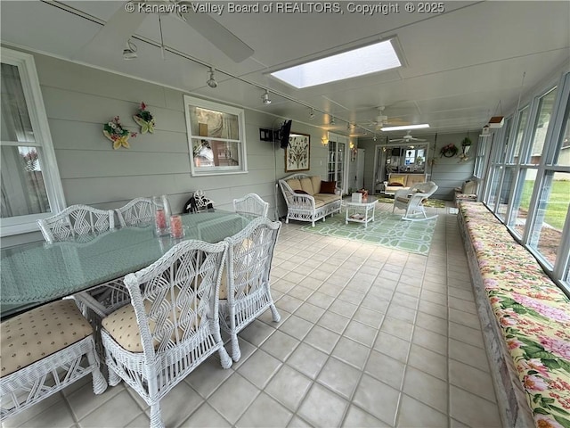 105 Sayer Cir, Logan, WV 25601 - sunroom with rail lighting, a skylight, a ceiling fan, an outdoor living space, and outdoor dining space