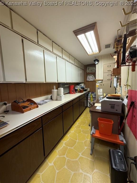 105 Sayer Cir, Logan, WV 25601 - kitchen with dark brown cabinets, light countertops, and white cabinets