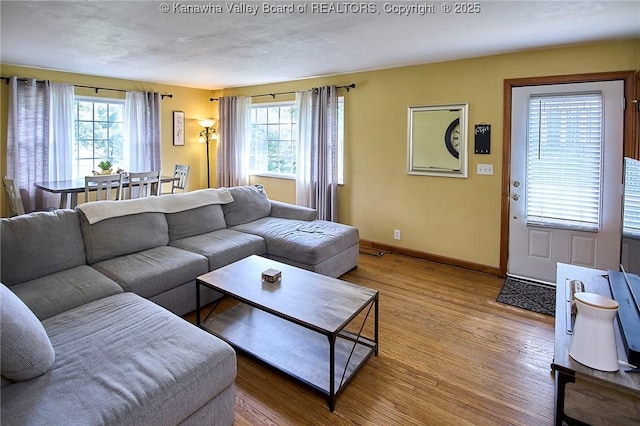 318 Monroe St, South Charleston, WV 25303 - living room featuring healthy amount of natural light and wood finished floors