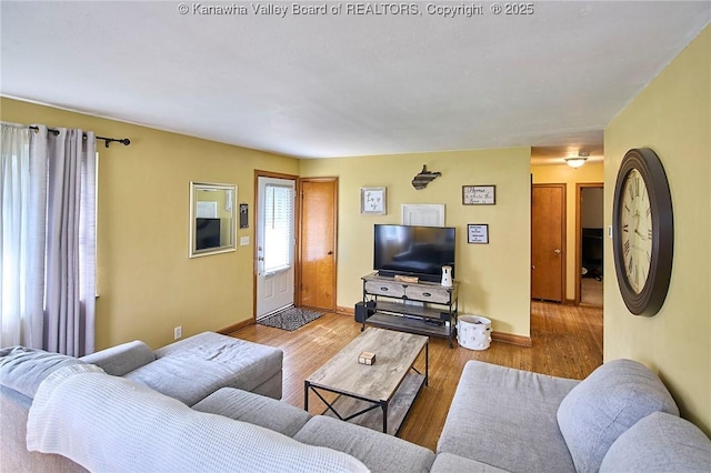 318 Monroe St, South Charleston, WV 25303 - living room with baseboards and wood finished floors