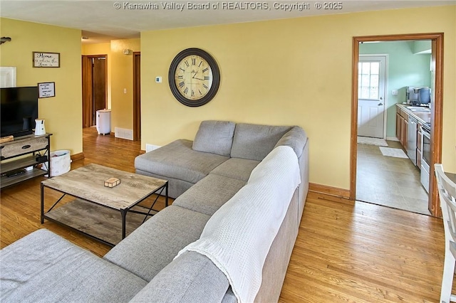 318 Monroe St, South Charleston, WV 25303 - living room featuring wood finished floors