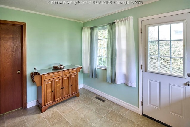318 Monroe St, South Charleston, WV 25303 - entryway with ornamental molding and light tile patterned floors