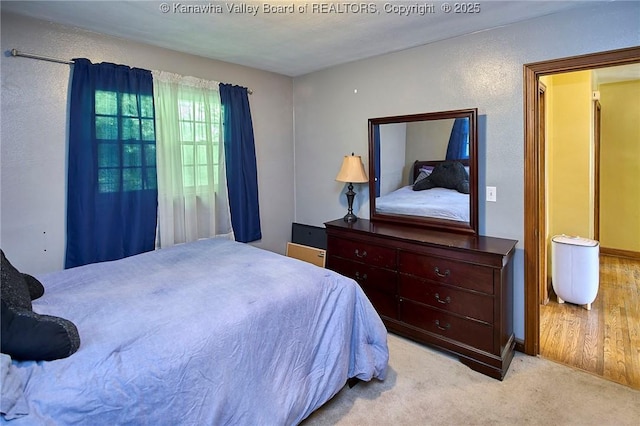 318 Monroe St, South Charleston, WV 25303 - carpeted bedroom featuring a textured wall
