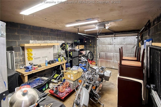 318 Monroe St, South Charleston, WV 25303 - garage with concrete block wall and a garage door opener