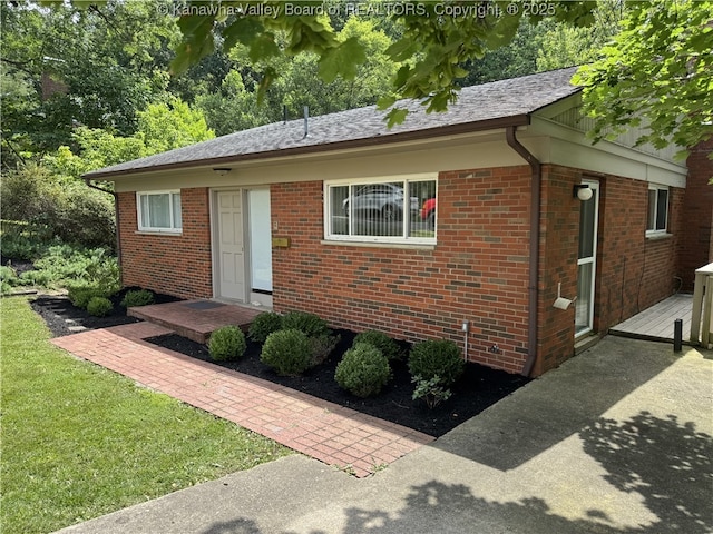 119 Swarthmore Ave, Charleston, WV 25302 - view of front of house featuring brick siding and a deck