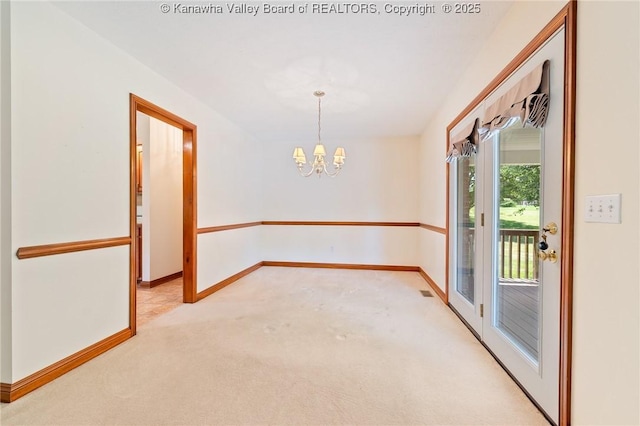 182 Summer Dr, Culloden, WV 25510 - empty room with a chandelier and light carpet
