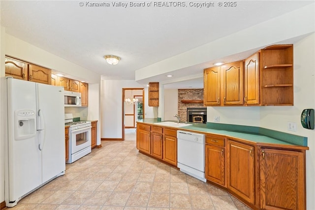 182 Summer Dr, Culloden, WV 25510 - kitchen featuring white appliances, brown cabinetry, open shelves, and light countertops