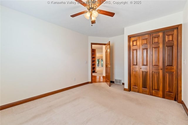 182 Summer Dr, Culloden, WV 25510 - unfurnished bedroom featuring light carpet, a closet, and ceiling fan