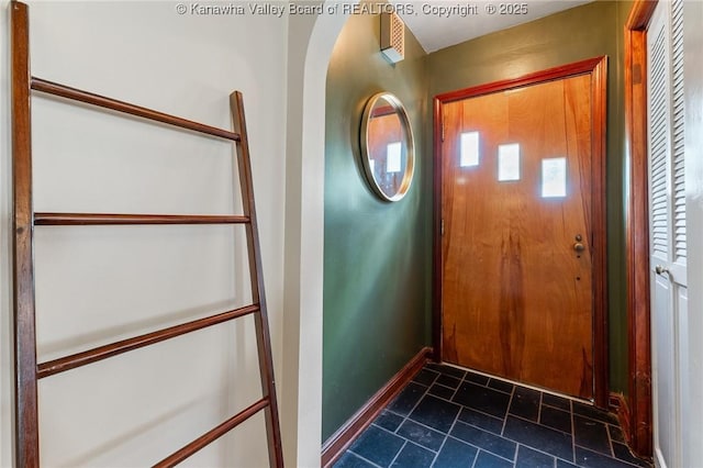 51 Roland Park Dr, Huntington, WV 25705 - foyer entrance featuring baseboards and stone tile floors