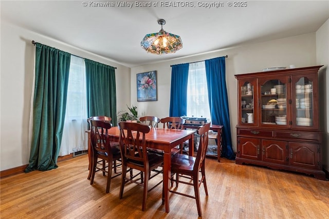 51 Roland Park Dr, Huntington, WV 25705 - dining room with light wood finished floors