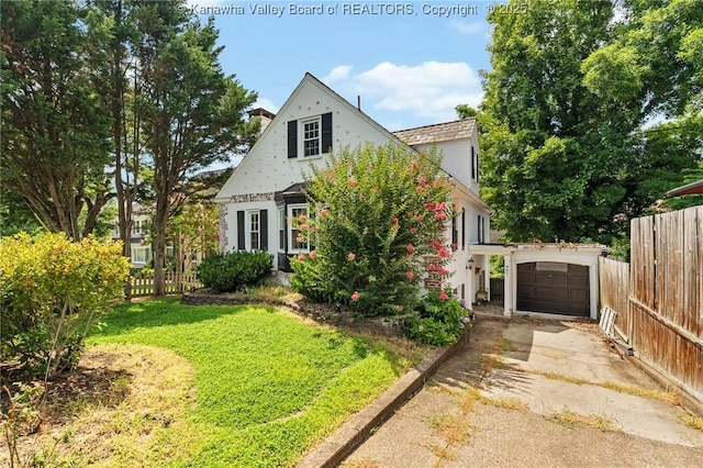 887 Poplar Rd, Charleston, WV 25302 - tudor home with driveway and stucco siding