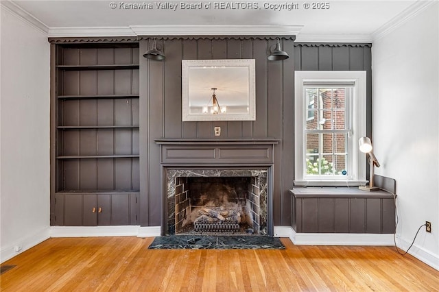 887 Poplar Rd, Charleston, WV 25302 - unfurnished living room with crown molding, wood finished floors, and a fireplace