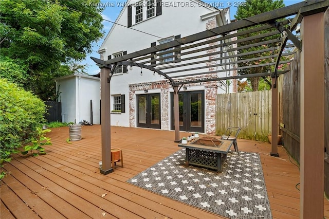 887 Poplar Rd, Charleston, WV 25302 - wooden deck featuring french doors, a pergola, and an outdoor fire pit