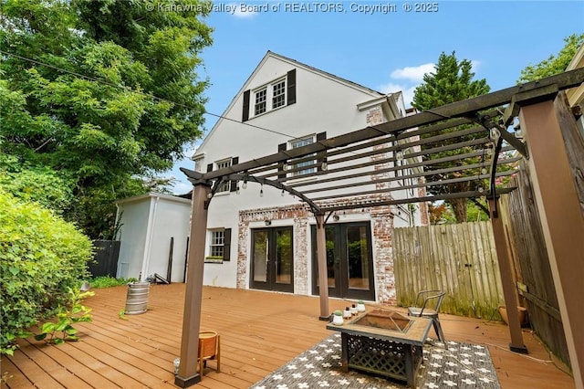 887 Poplar Rd, Charleston, WV 25302 - wooden deck with an outdoor fire pit, french doors, and a pergola