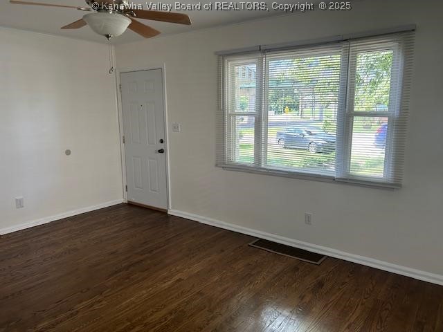 3503 Virginia Ave SE, Charleston, WV 25304 - spare room featuring ceiling fan and dark wood-style floors