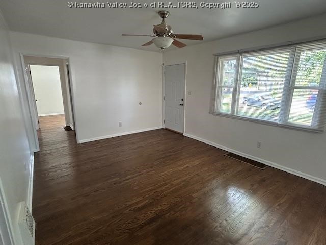 3503 Virginia Ave SE, Charleston, WV 25304 - unfurnished room with a ceiling fan and dark wood-type flooring