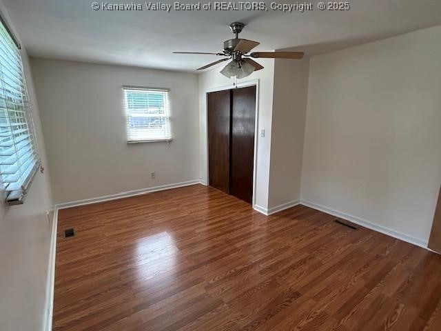 3503 Virginia Ave SE, Charleston, WV 25304 - unfurnished bedroom featuring wood finished floors, a closet, and ceiling fan
