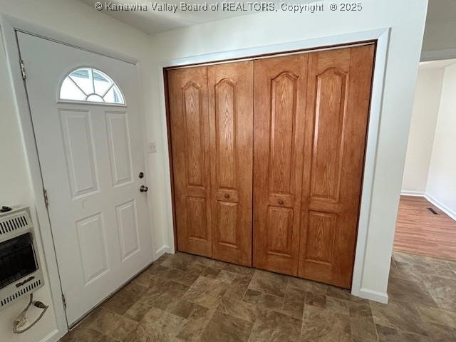 3503 Virginia Ave SE, Charleston, WV 25304 - foyer featuring heating unit and stone finish floors