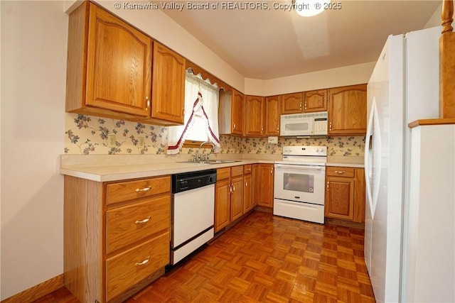 5126 Big Tyler Rd, Cross Lanes, WV 25313 - kitchen featuring white appliances, brown cabinetry, and light countertops