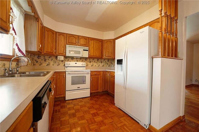 5126 Big Tyler Rd, Cross Lanes, WV 25313 - kitchen with white appliances, brown cabinetry, and light countertops