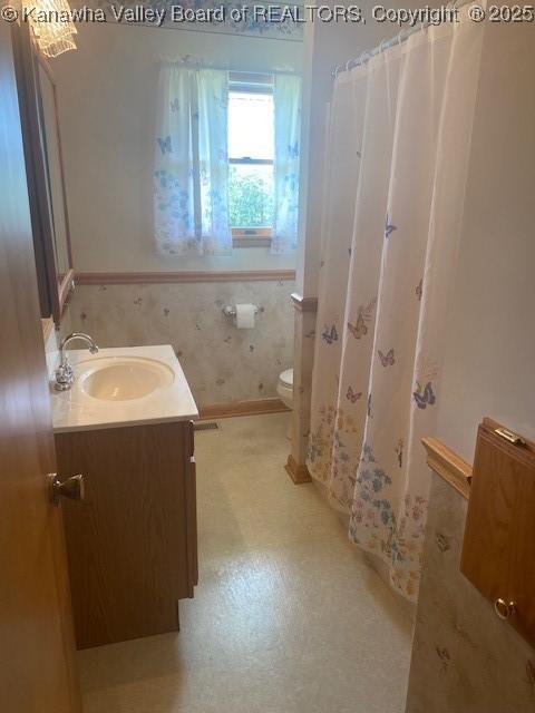 5126 Big Tyler Rd, Cross Lanes, WV 25313 - full bathroom with vanity and toilet