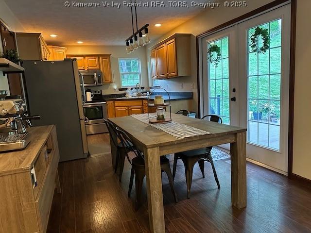 14 Perkins Way, Cross Lanes, WV 25313 - kitchen with stainless steel appliances, dark wood-style floors, recessed lighting, and decorative light fixtures