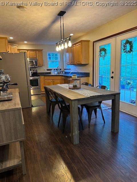 14 Perkins Way, Cross Lanes, WV 25313 - kitchen with stainless steel appliances, dark wood-style flooring, a textured ceiling, recessed lighting, and decorative light fixtures