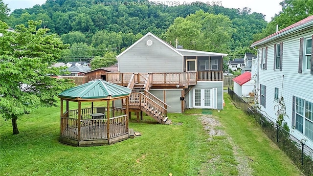 5309 Venable Ave SE, Charleston, WV 25304 - back of house featuring a deck, french doors, stairway, a sunroom, and a forest view