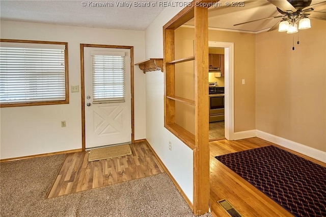 5309 Venable Ave SE, Charleston, WV 25304 - mudroom featuring wood finished floors and a ceiling fan