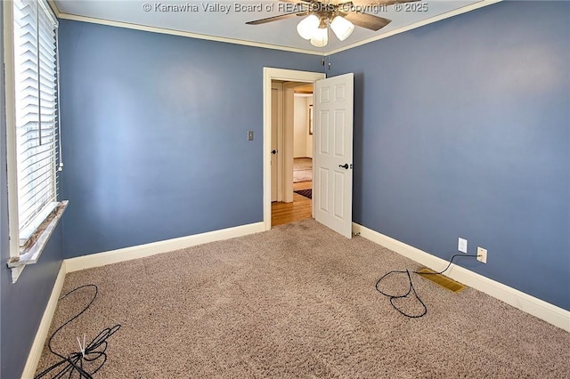 5309 Venable Ave SE, Charleston, WV 25304 - carpeted spare room with ceiling fan and ornamental molding