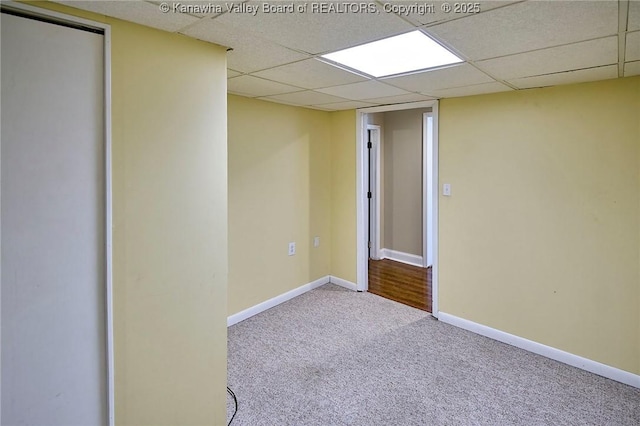 5309 Venable Ave SE, Charleston, WV 25304 - carpeted empty room with a paneled ceiling and baseboards