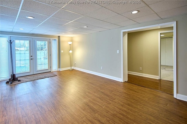 5309 Venable Ave SE, Charleston, WV 25304 - empty room with french doors, a drop ceiling, wood finished floors, and recessed lighting