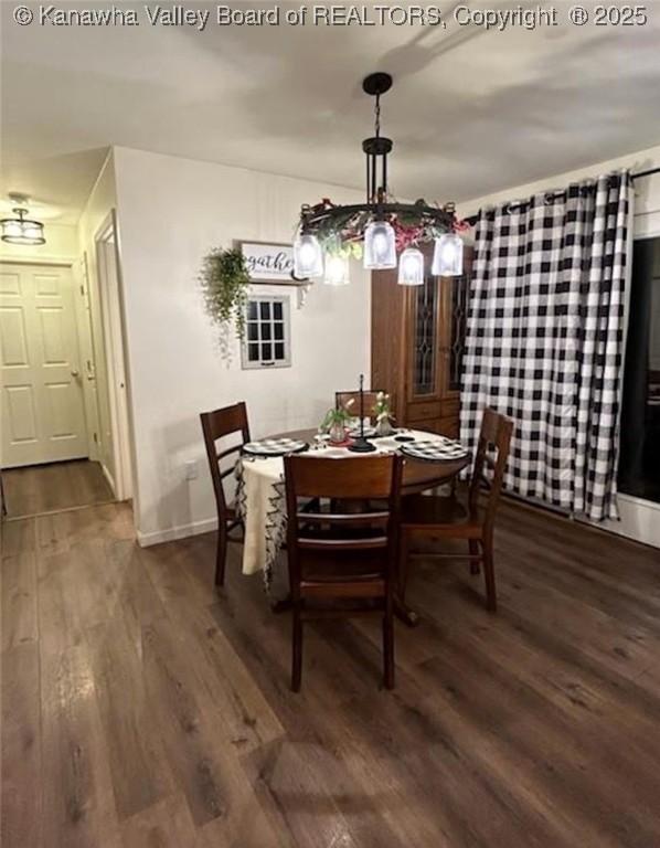 59 Pleasant Ln, Grantsville, WV 25147 - dining space with dark wood-style flooring and baseboards