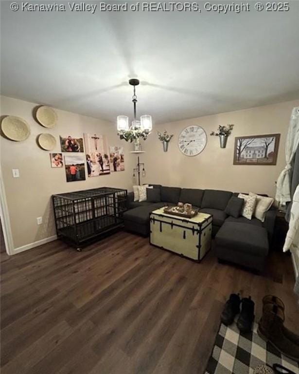 59 Pleasant Ln, Grantsville, WV 25147 - living room with wood finished floors and a chandelier