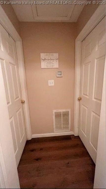 59 Pleasant Ln, Grantsville, WV 25147 - hall featuring dark wood-type flooring and baseboards