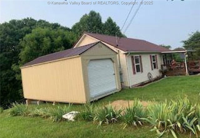 59 Pleasant Ln, Grantsville, WV 25147 - view of home's exterior with a lawn