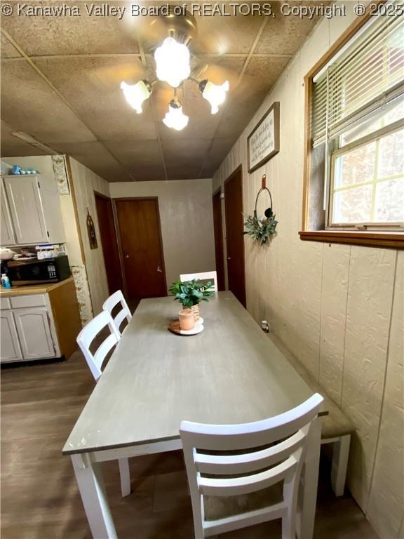 1091/2 Hillcrest Dr, Ripley, WV 25271 - dining space with dark wood finished floors and a chandelier