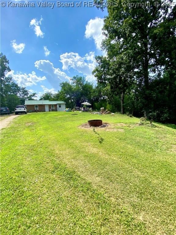 1091/2 Hillcrest Dr, Ripley, WV 25271 - view of grassy yard featuring driveway