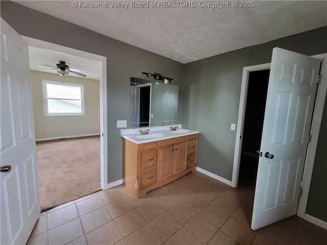 814 Madison Ave, Spencer, WV 25276 - full bathroom with double vanity, tile patterned floors, and ceiling fan