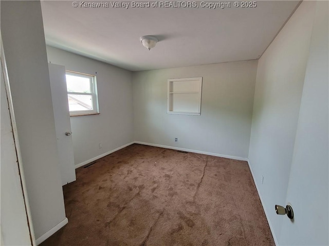 814 Madison Ave, Spencer, WV 25276 - spare room featuring carpet and baseboards