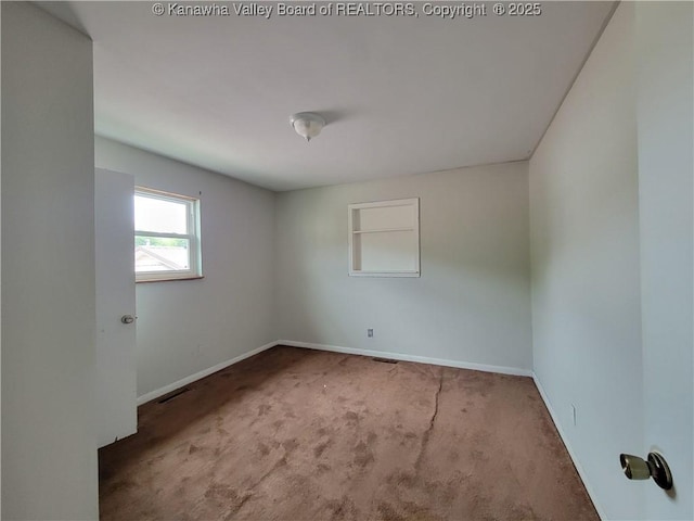 814 Madison Ave, Spencer, WV 25276 - carpeted spare room featuring baseboards
